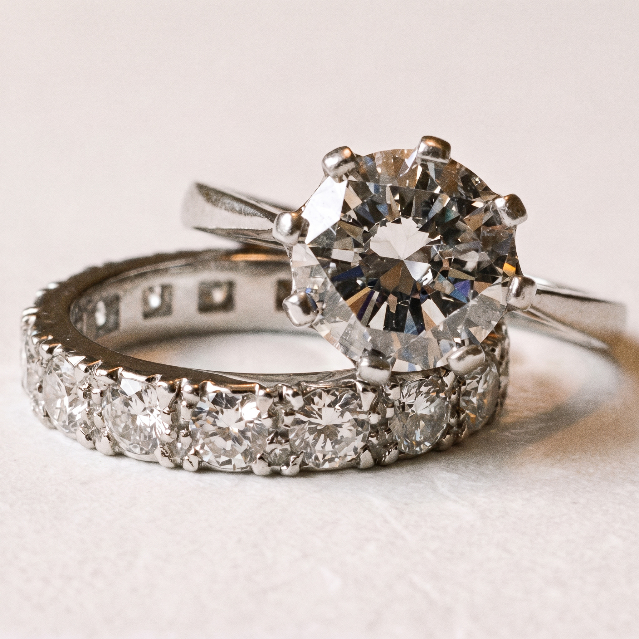 A diamond engagement ring with a diamond-set band